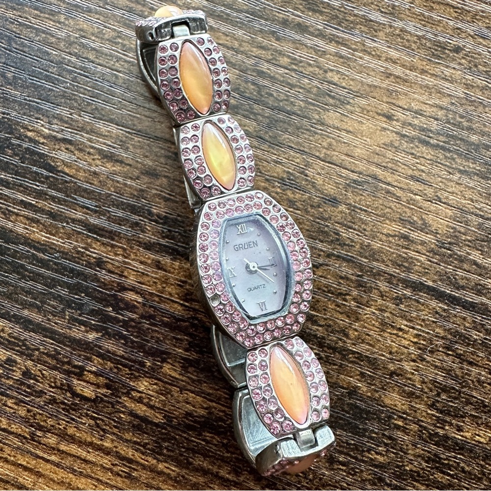 GRUEN Quartz Bangle Bracelet Watch - Pink
Rhinestones & Orange Cabochons